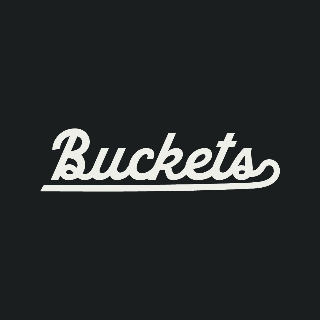 Ball and flag mark with the BUCKETS wordmark